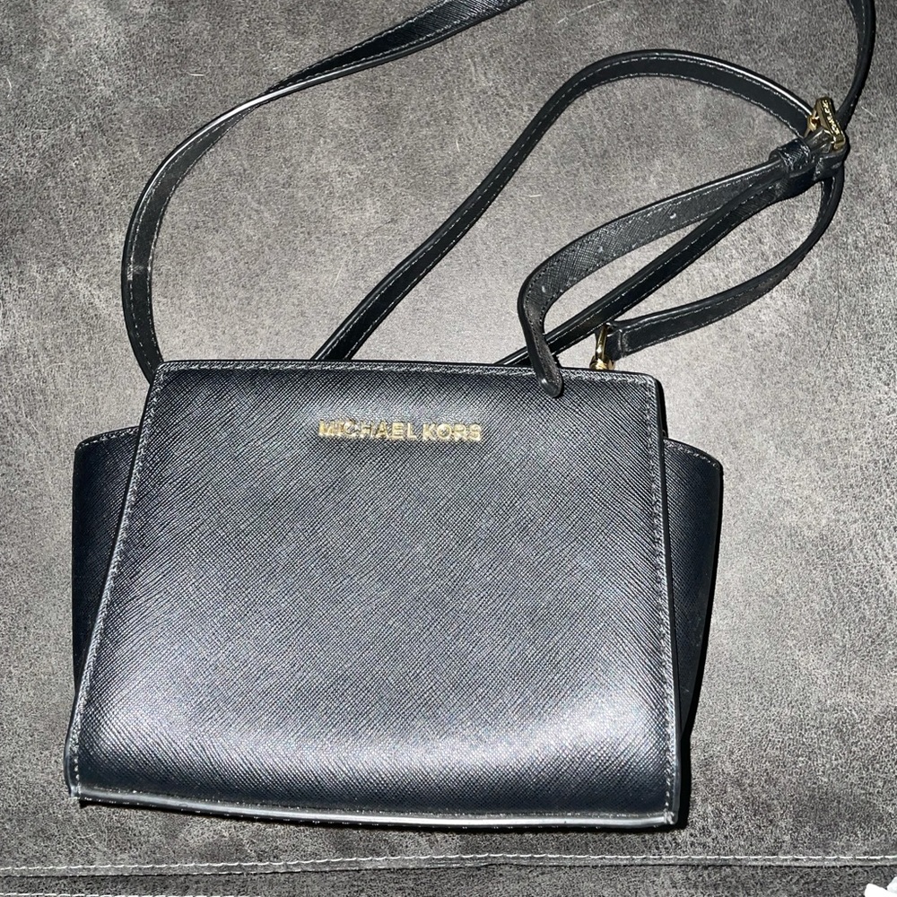 Michael Kors mini cross body purse.